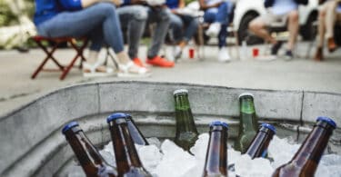 Glass bottles in metal ice bucket