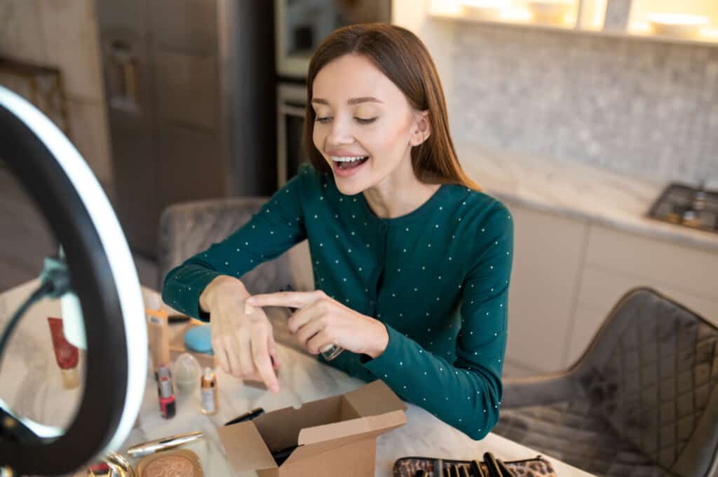 Woman testing makeup on her skin