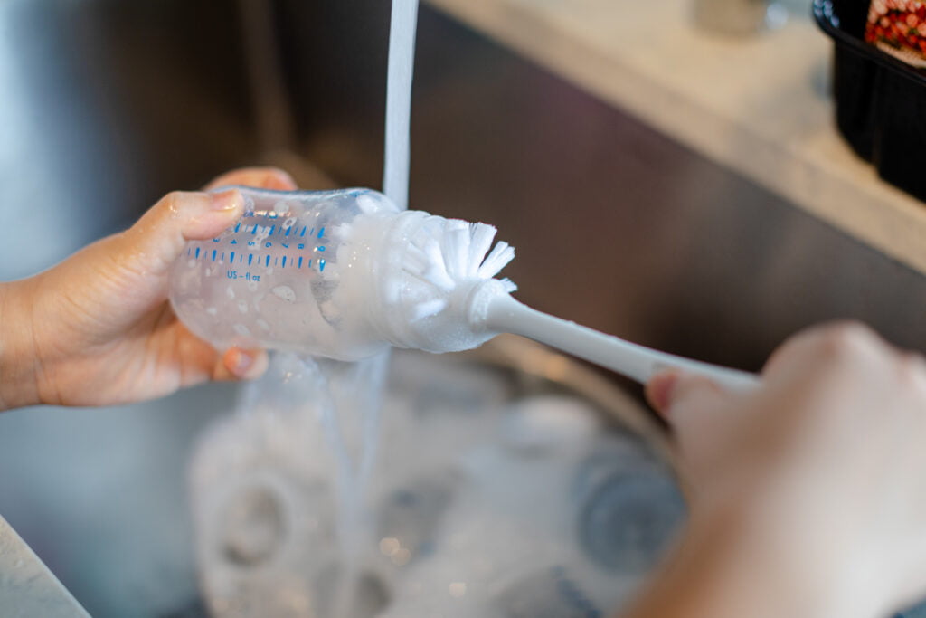 Washing bottle in sink